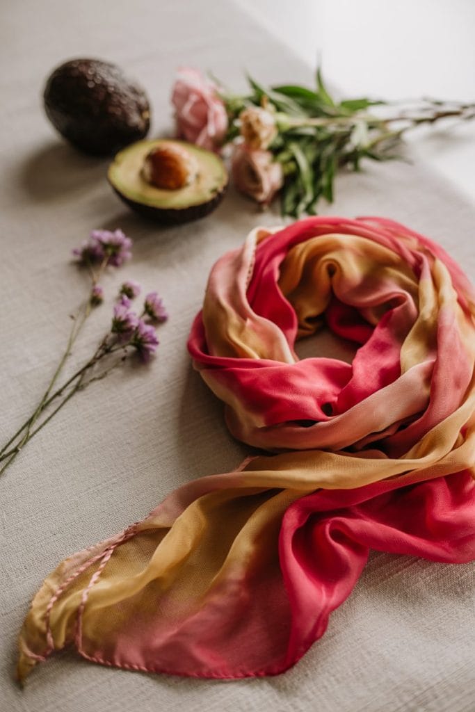 Hand-dyed silk scarf in pink and gold tones