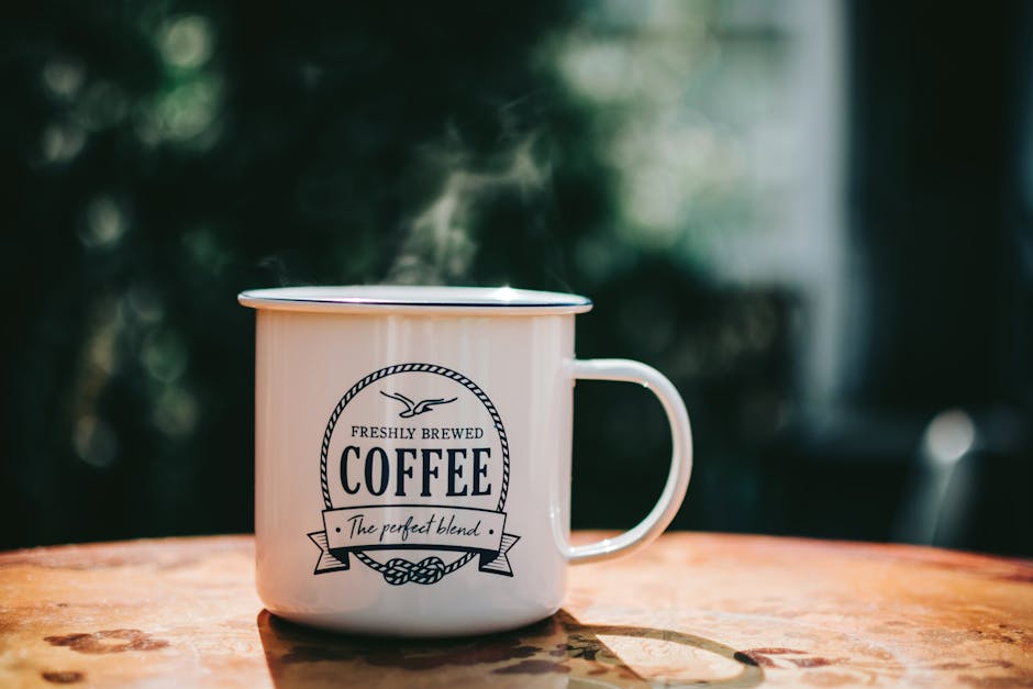 A coffee mug on a rustic wooden table, a bonus dad Father's Day gift idea for step dad