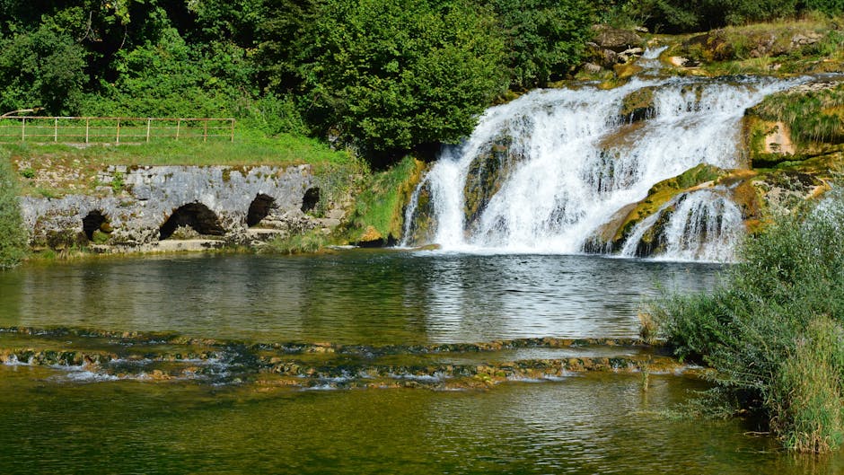 breathtaking summer waterfall in the countryside for a day trip