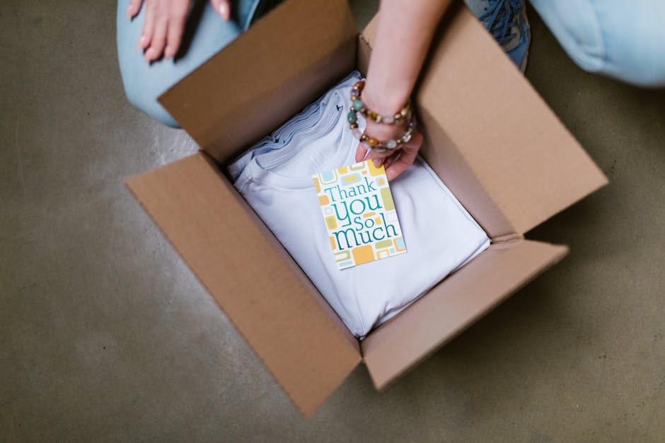 A subscription gift box being packed, a thoughtful Father's Day gift idea for step dad